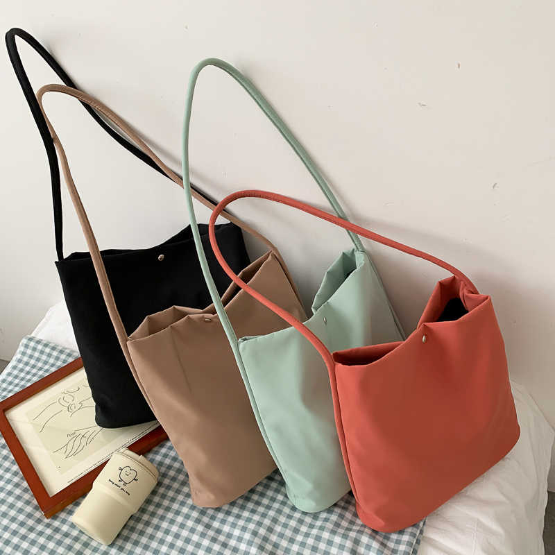 حقائب يد نسائية بسيطة غير رسمي - مراجعة Women Handheld Bags وسعره